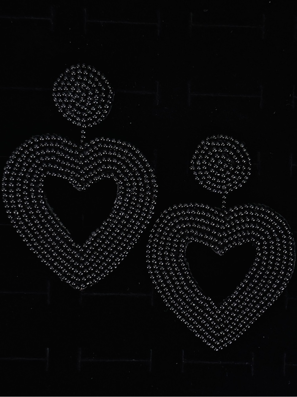 Beautiful, black beaded heart shaped pierced dangle costume earrings